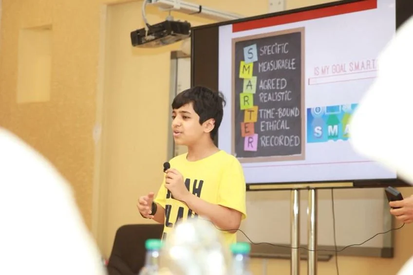 Muhammad aged eleven giving a workshop on SMART goals